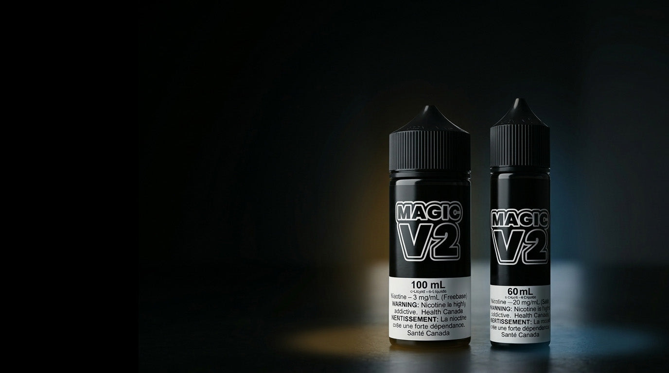 Two black bottles of Magic V2 e-liquid on a dark background