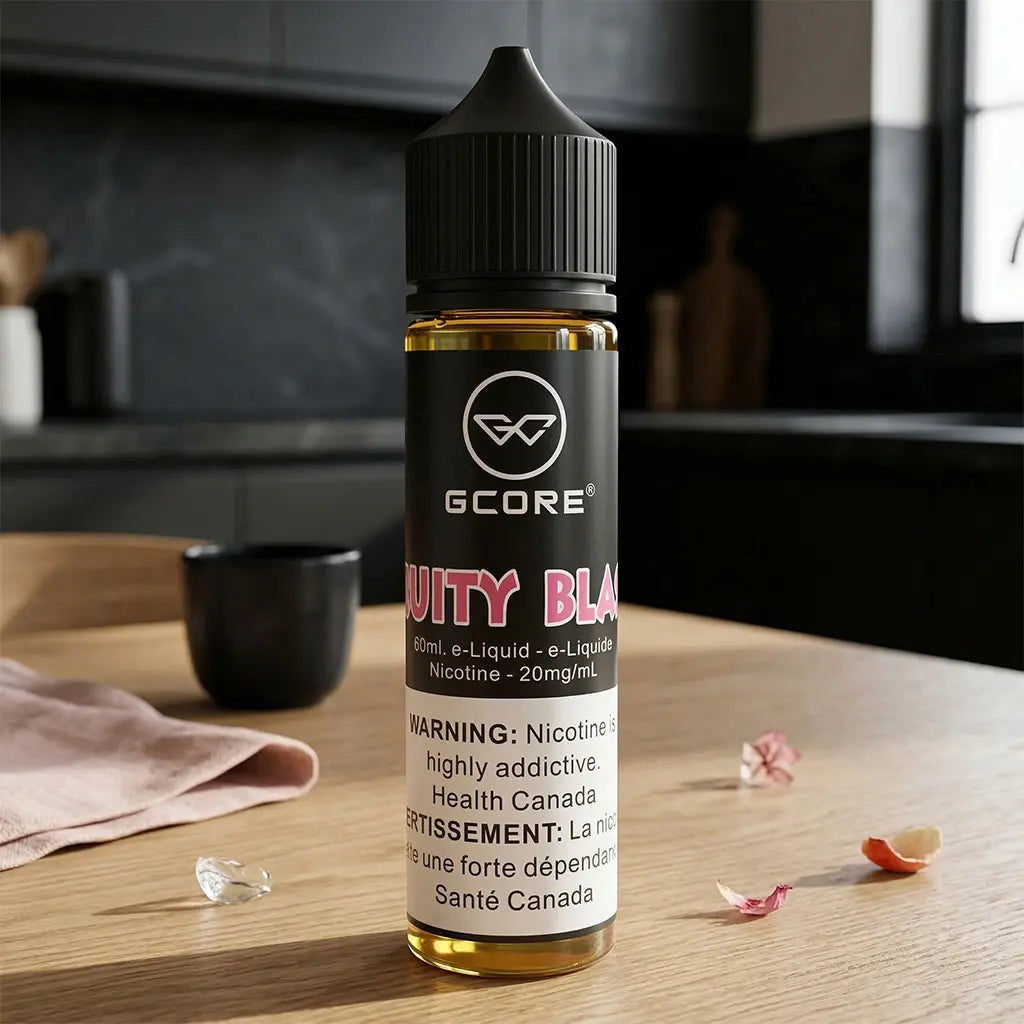 Gcore Vapors e-liquid bottle on a wooden surface with a kitchen background